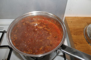 Simmering rosehip syrup